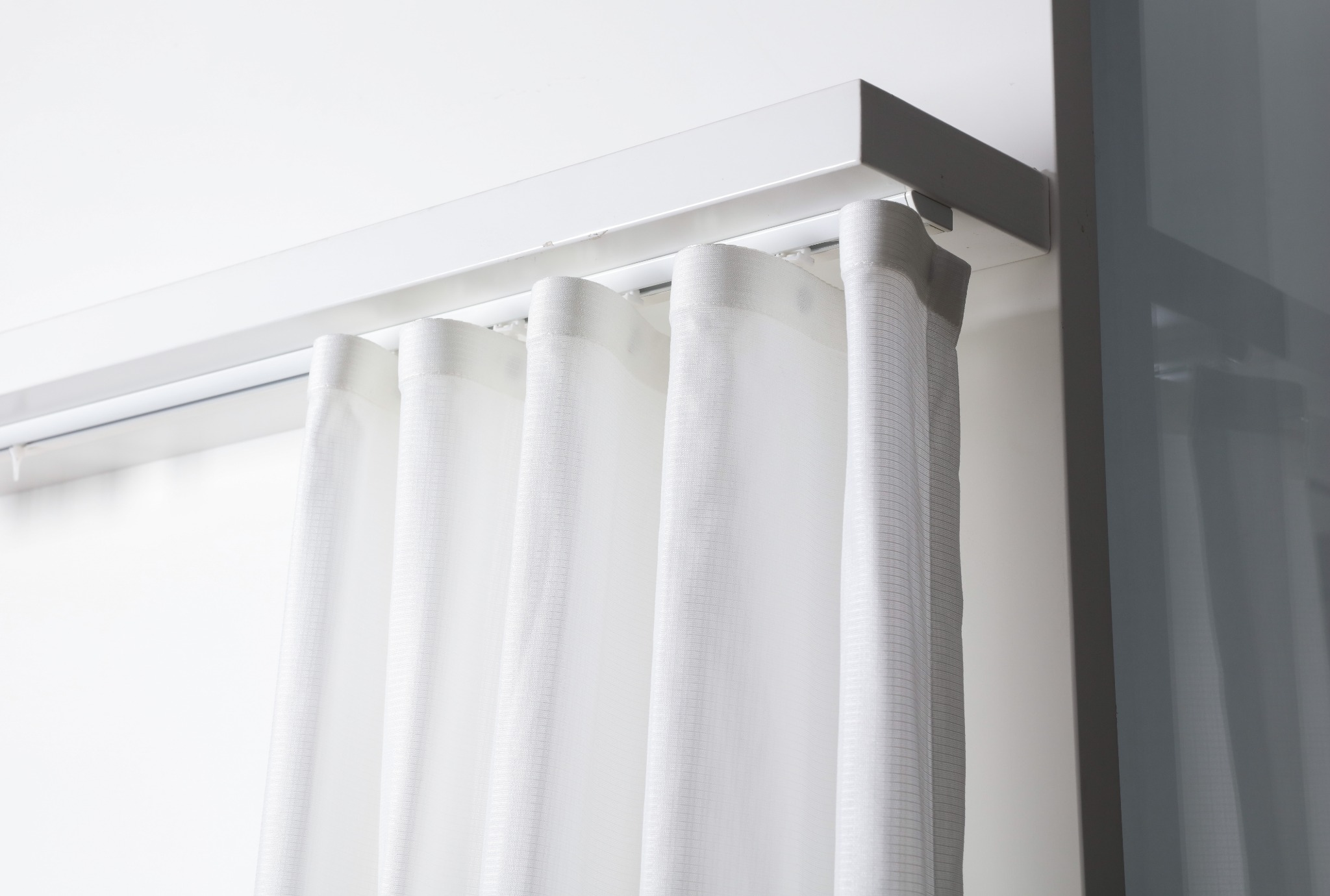 A26 installed at the ceiling with curtains
